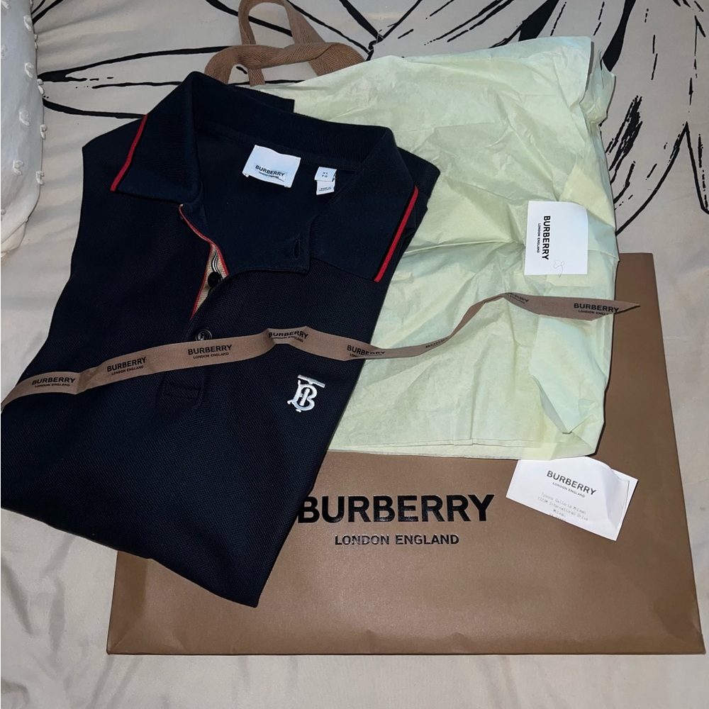 Authentic Burberry polo men shirt…color navy blue.